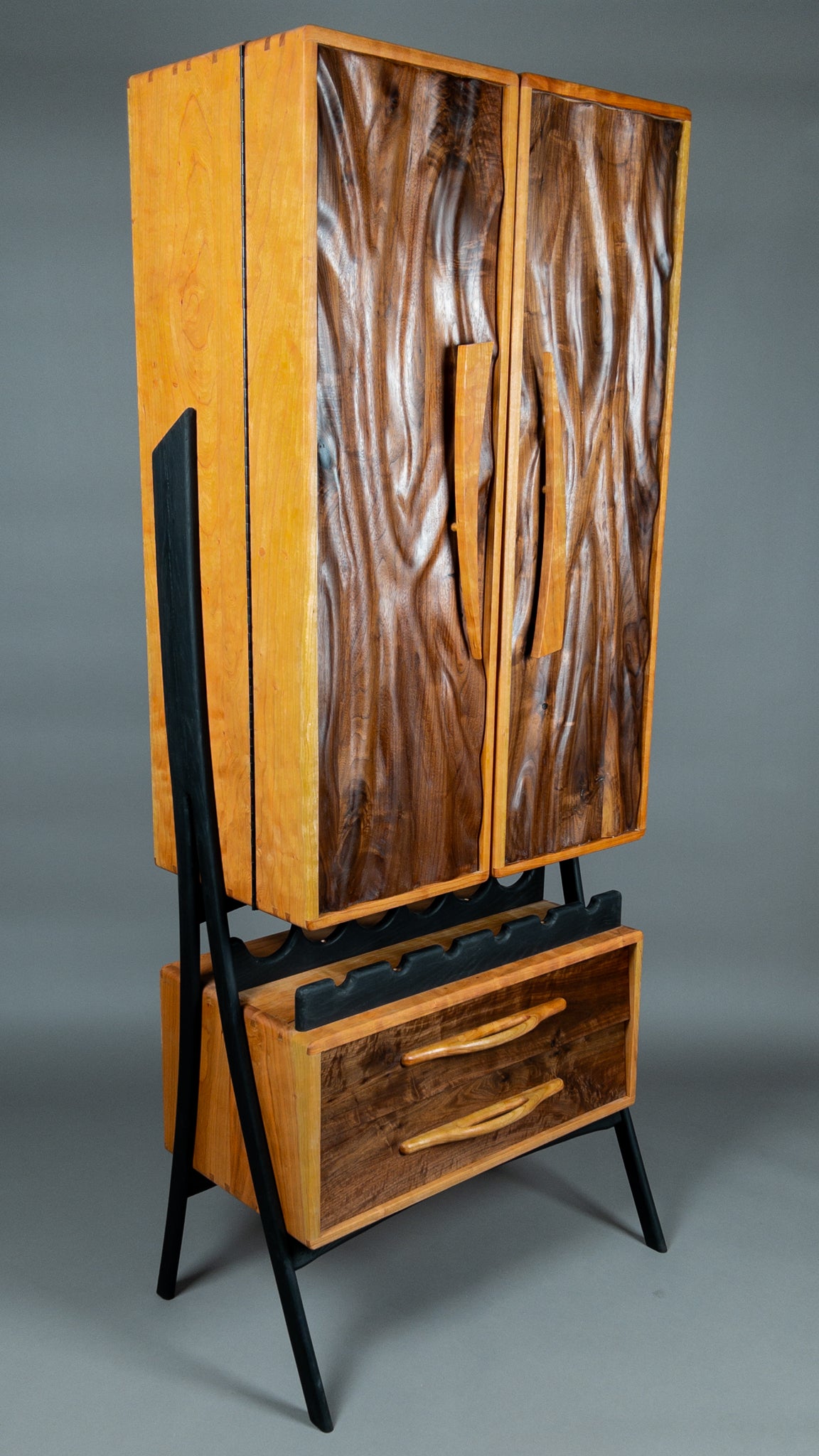 hand carved liquor cabinet